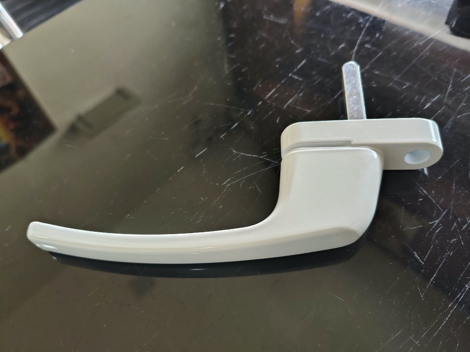 Glass gate handle detail